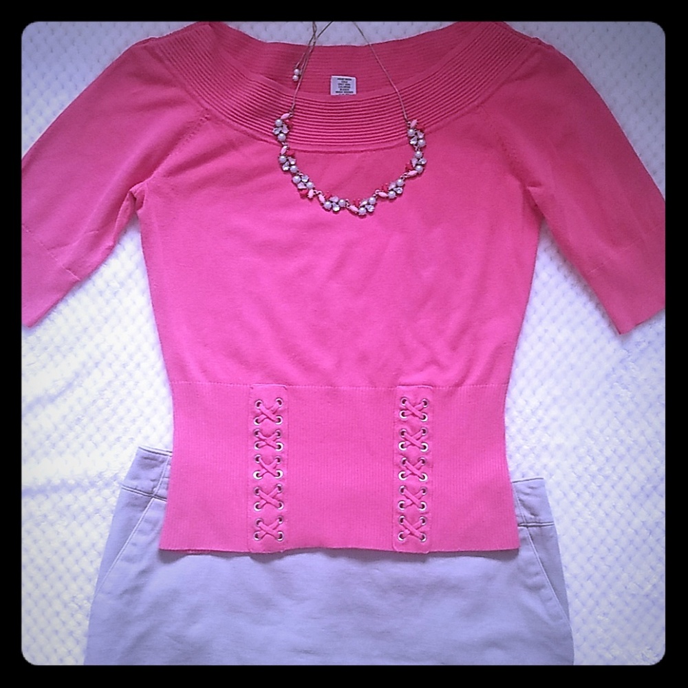 Coral sweater with criss-cross detail
